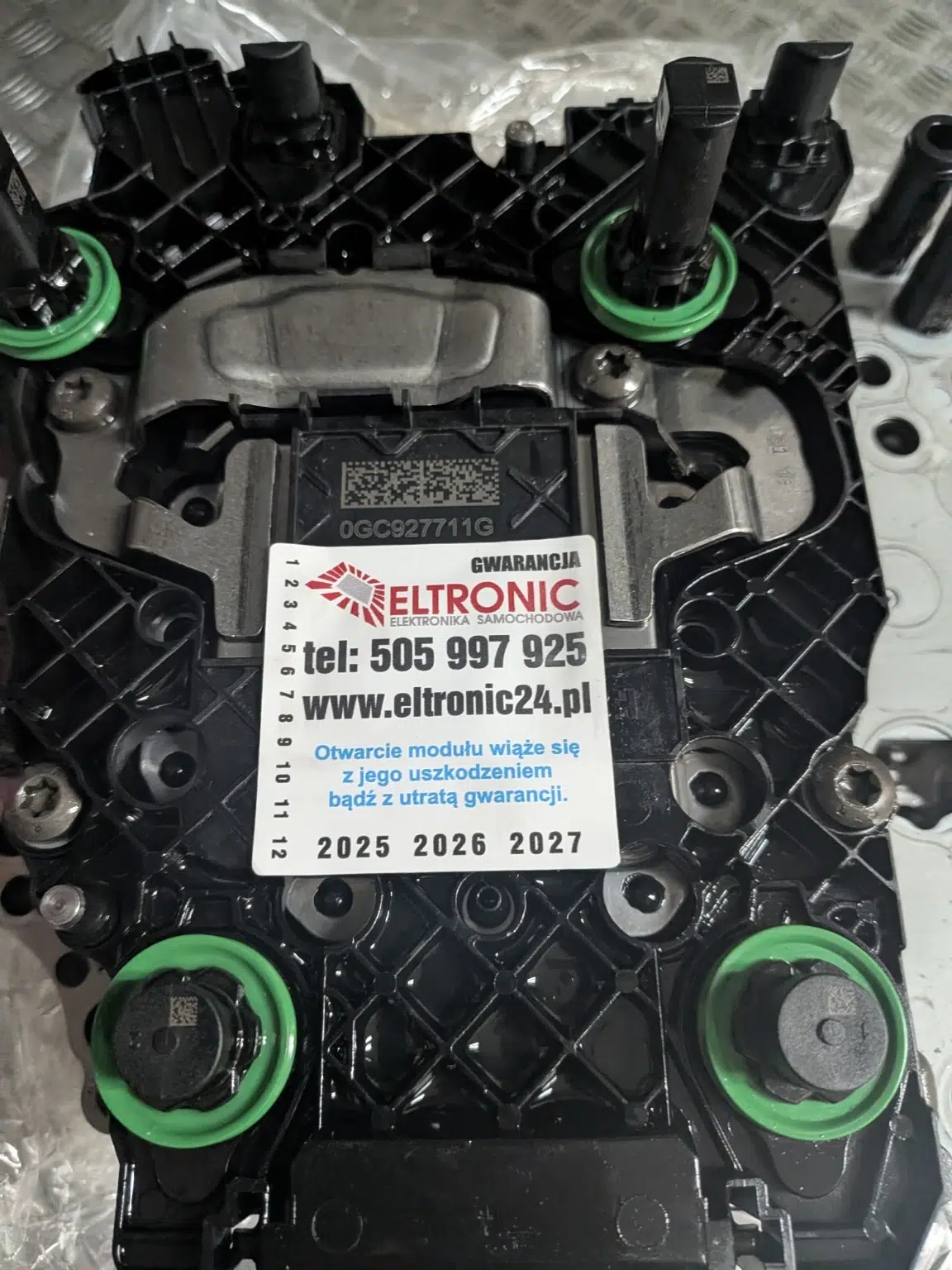 Sterownik 0GC927711G z czytelnym numerem TCU i naklejką Eltronic